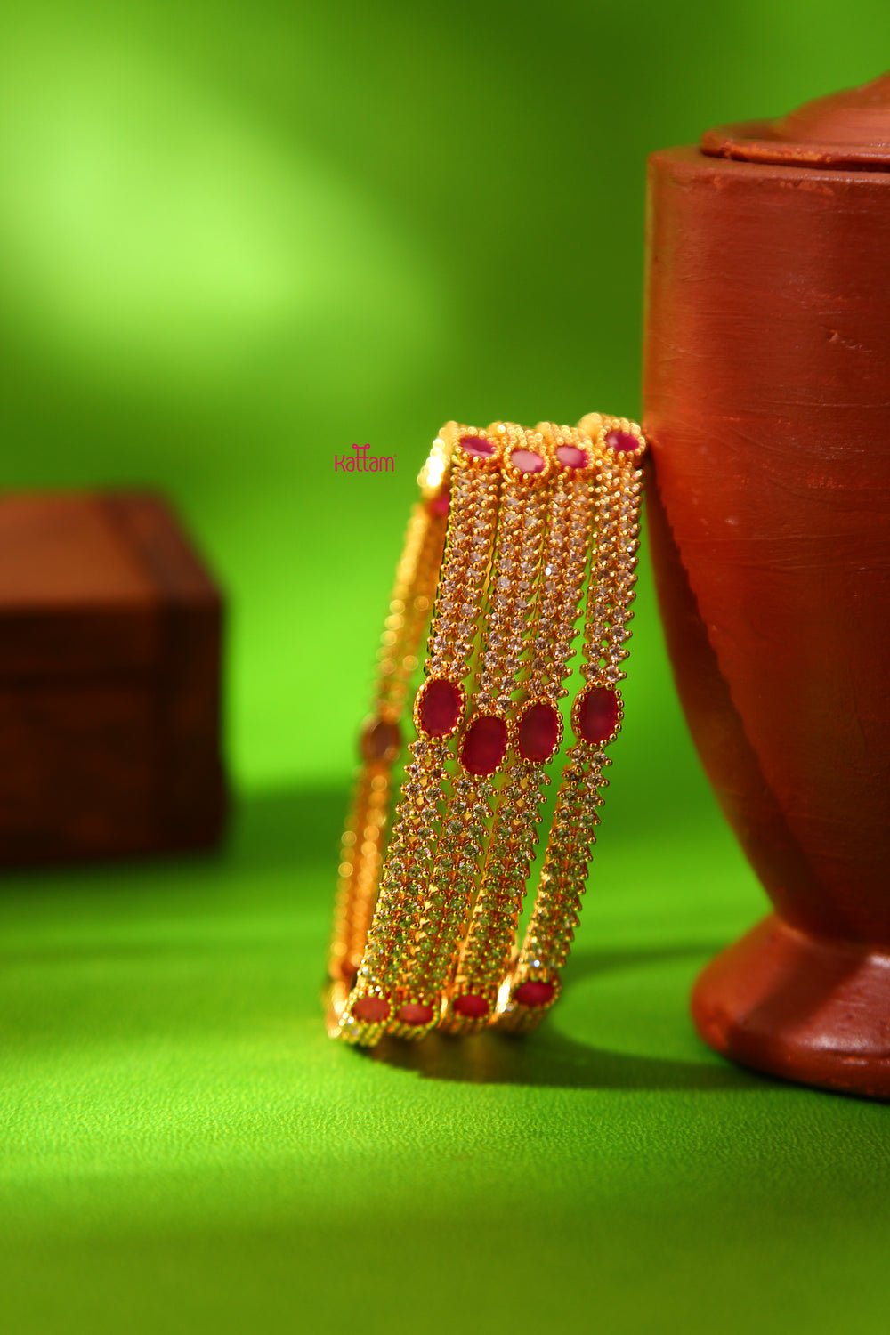 Ruby White Stone Golden Bangle Set of 4 - B058