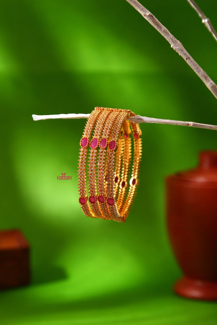 Ruby White Stone Golden Bangle Set of 4 - B058