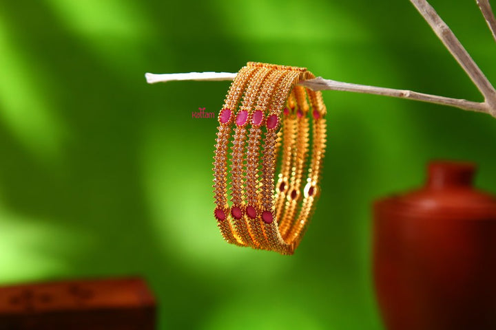 Ruby White Stone Golden Bangle Set of 4 - B058